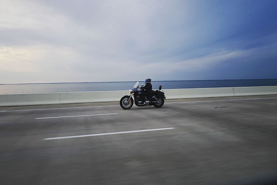 person riding touring motorcycle on gray concrete road, vehicle, HD wallpaper