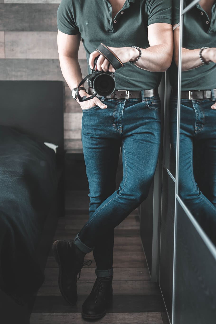 man holding DSLR camera inside room, denim, apparel, pants, jeans HD wallpaper