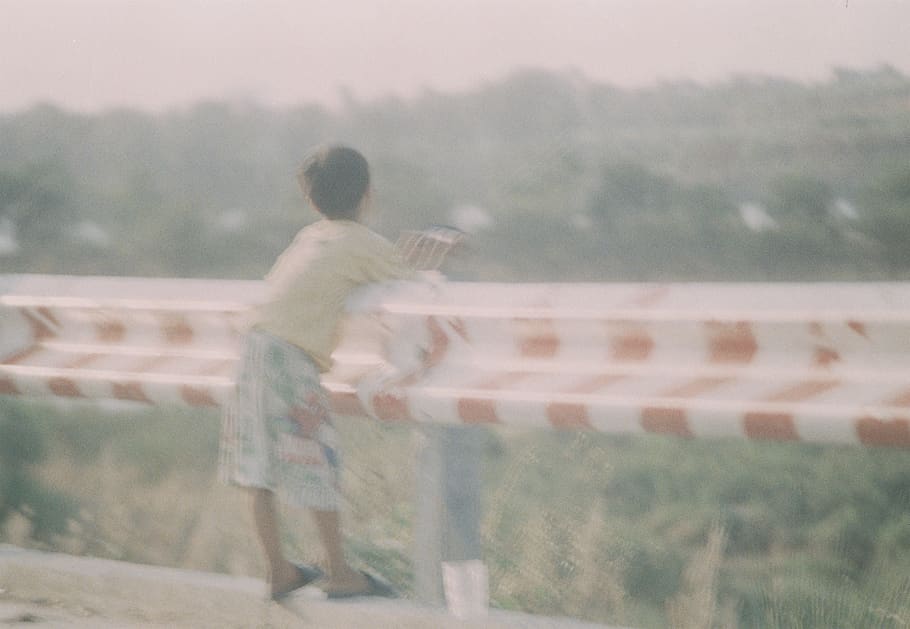boy standing near railing, person, human, nature, fog, smoke HD wallpaper