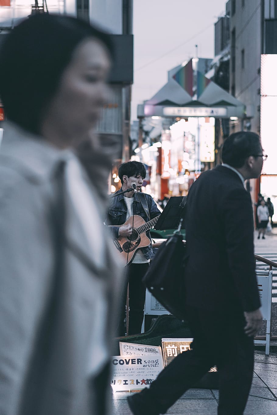 selective focus photography of man playing guitar on street, clothing, HD wallpaper