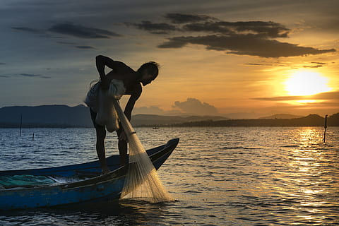 HD wallpaper: man riding fishing boat on body of water, person