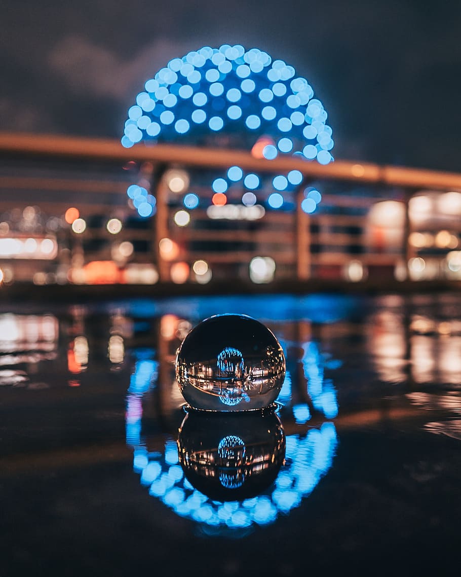 selective focus photography of waterball with ball monument, reflection HD wallpaper