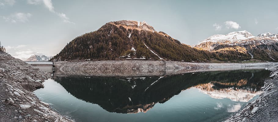 Green Covered Mountain Reflected on Calm Water Under Clear Sky Landscape Photo HD wallpaper