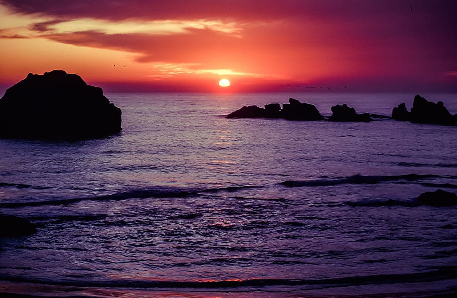 Sunset over the coast of Bandon Beach in Oregon, USA, bright