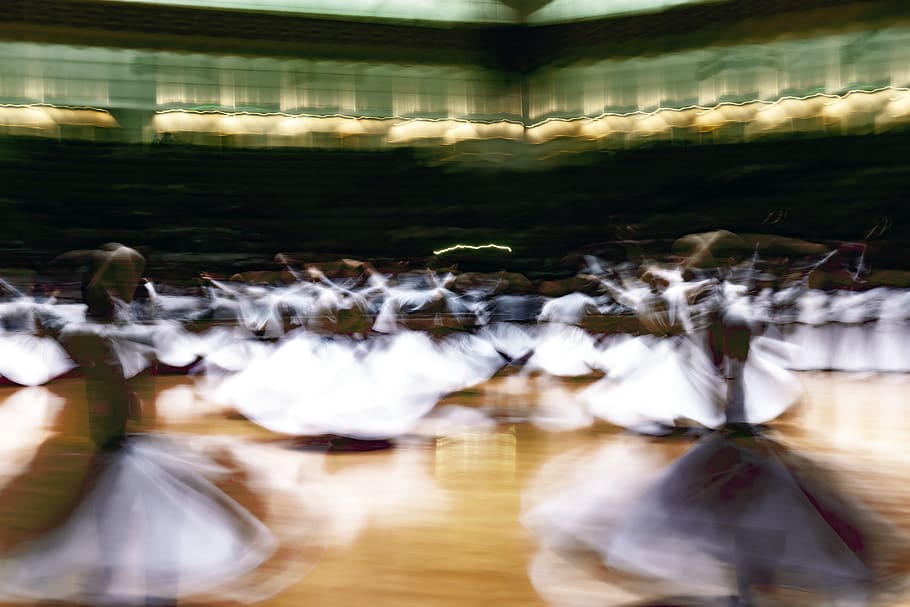 Dervish dancers on floor, konya culture center, leisure activities