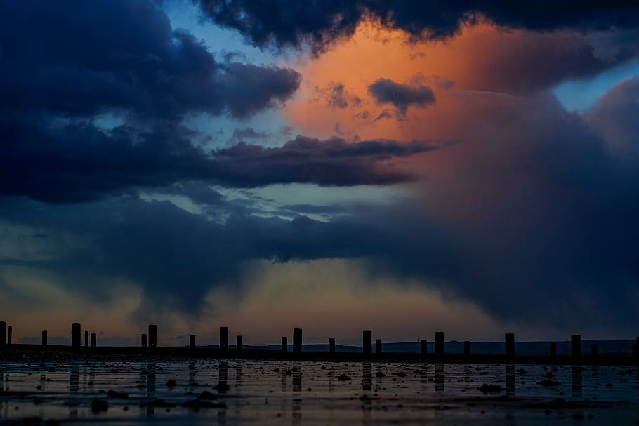 storm, sunset, clouds, beach, columns, uk, nature, sea, ocean HD wallpaper