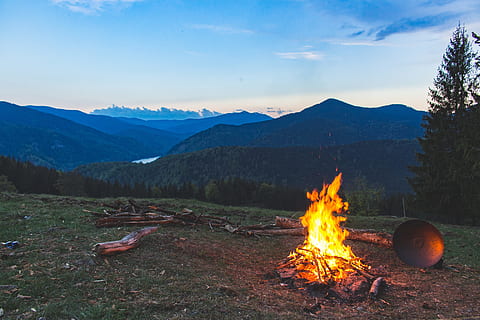 Bonfire Surrounded With Green Grass Field, camp, campfire, camping HD wallpaper