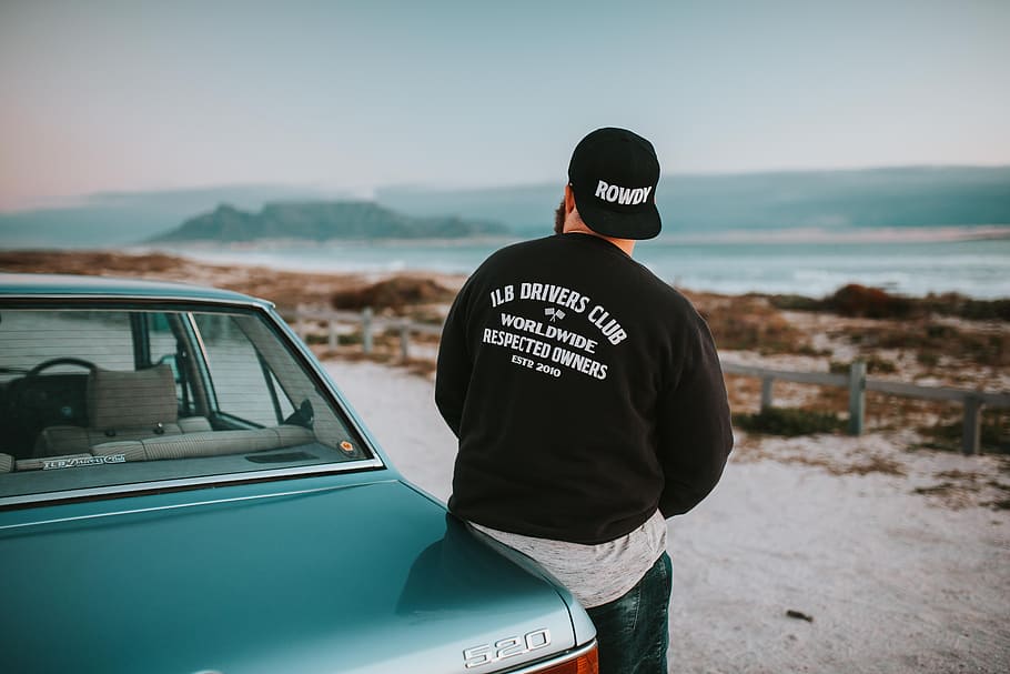 photo of man leaning on car, male, hat, jacket, fashion, style