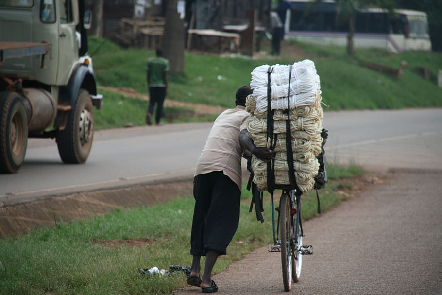 HD wallpaper: bike, cargo transport, africa, uganda, work force, slide ...