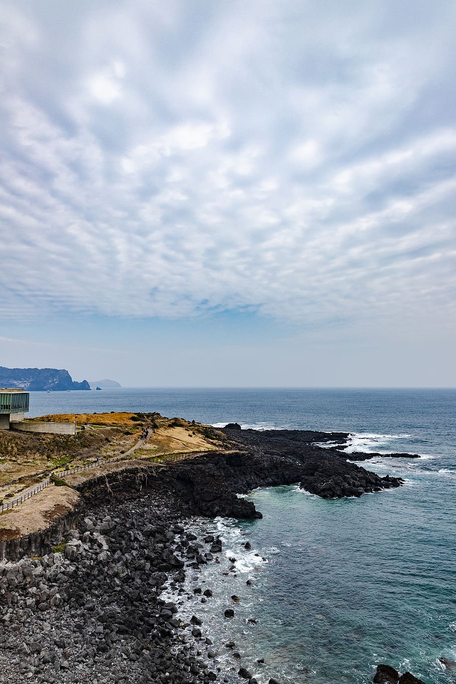 blue beach under white clouds, promontory, architecture, building HD wallpaper