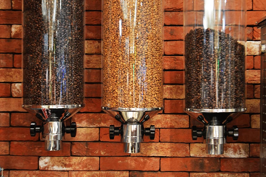 view of three varieties of coffee beans inside coffee dispensers, HD wallpaper