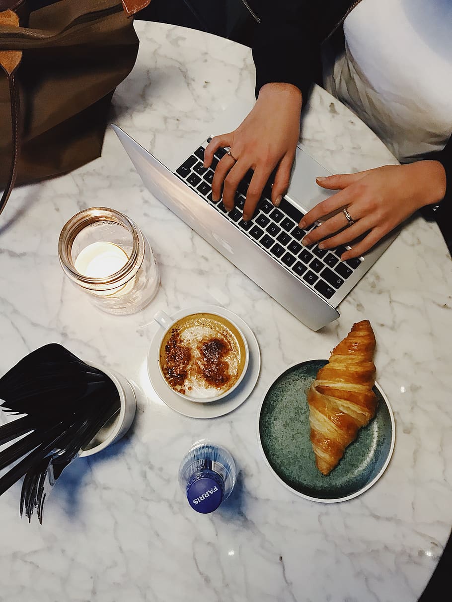 Person Typing On Laptop Keyboard, bread, coffee, croissant, drink