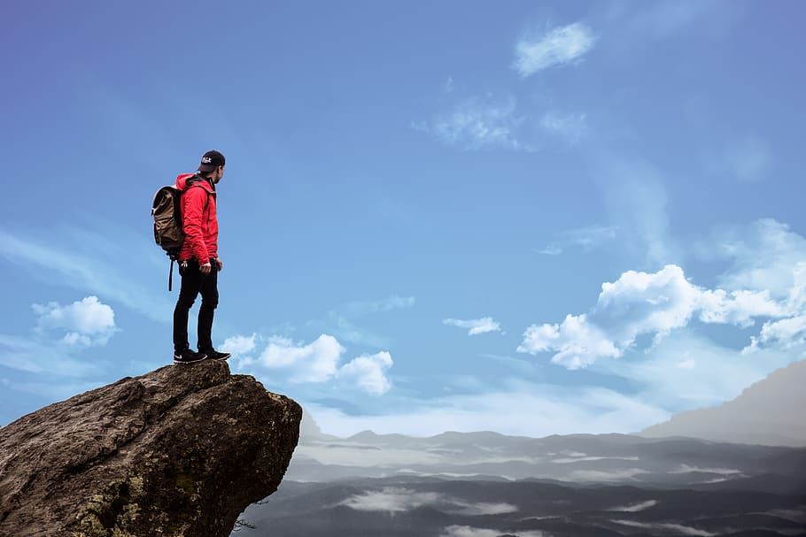 Man Standing on Cliff Photography, adult, adventure, backpacker, HD wallpaper