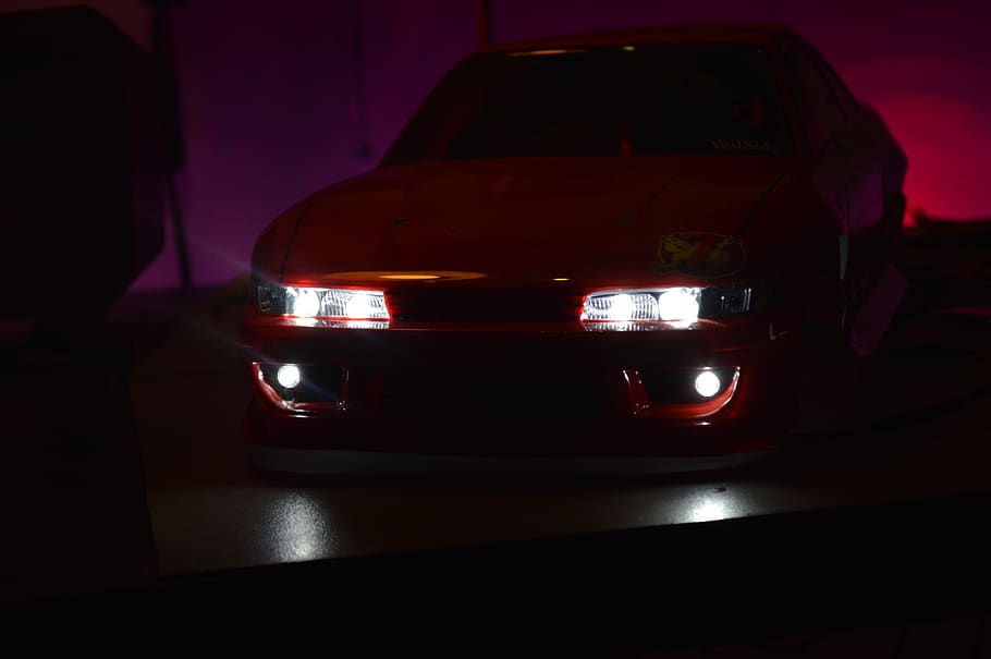 macro, front lights, rc-car, led, indoors, night, red, close-up HD wallpaper