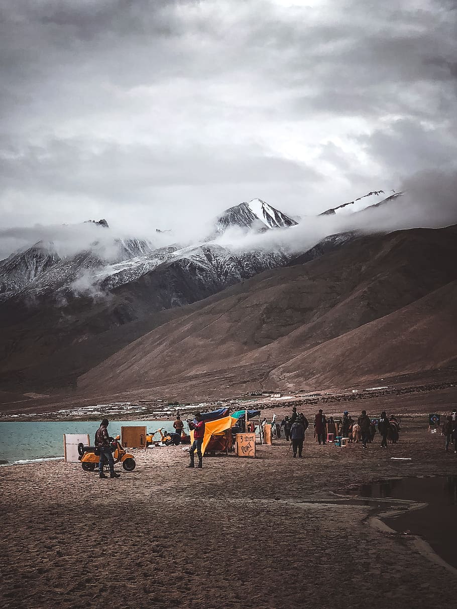 group of person beside mountain under cloudy sky, crowd, mist HD wallpaper