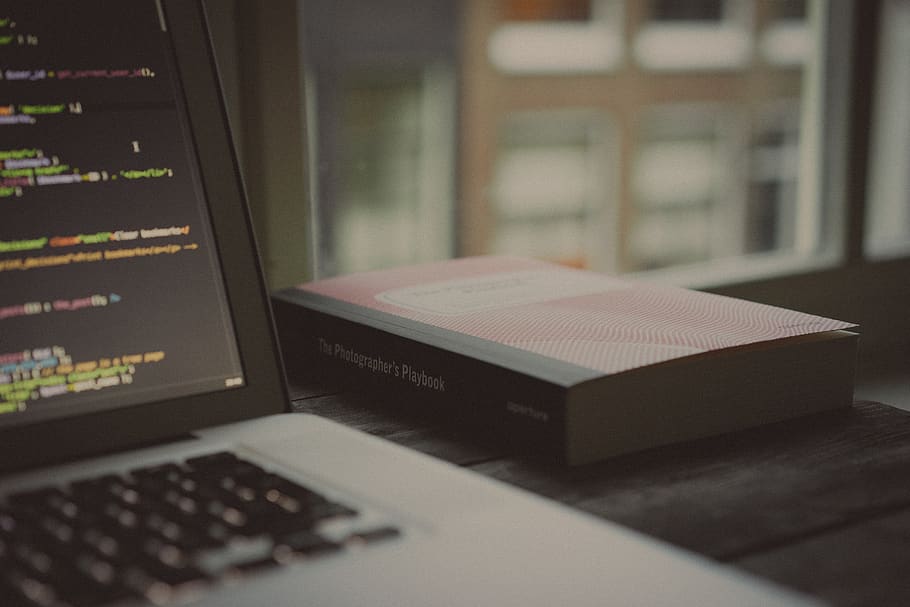 book beside laptop computer, indoors, no people, finance, close-up HD wallpaper