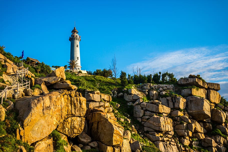 lighthouse, sea, sunset, water, beach, ocean, sky, blue, seascape HD wallpaper
