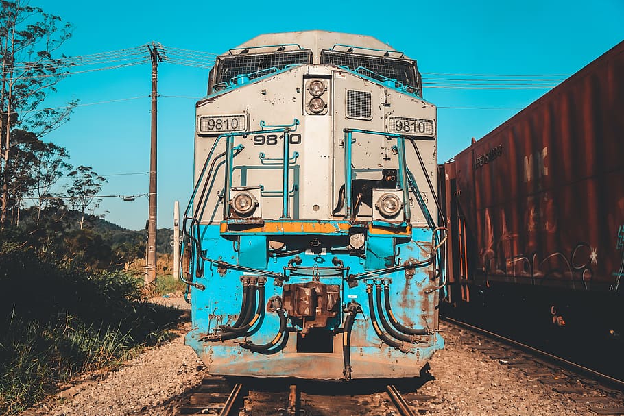 gray and blue train on railing beside green plants, rail transportation, HD wallpaper