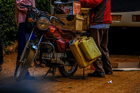 man standing beside motorcycle, vehicle, transportation, person HD wallpaper