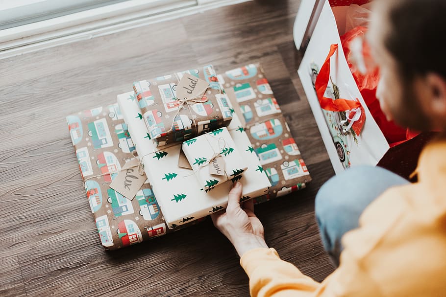 person holding gift boxes, human, wood, flooring, finger, hardwood, HD wallpaper