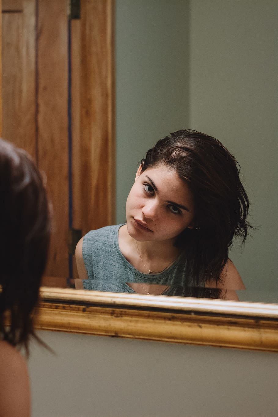 woman facing mirror, headshot, portrait, real people, indoors HD wallpaper