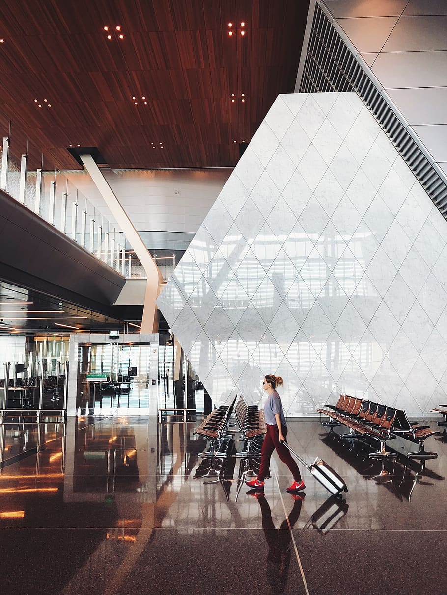 person walking inside aiport, real people, architecture, indoors HD wallpaper