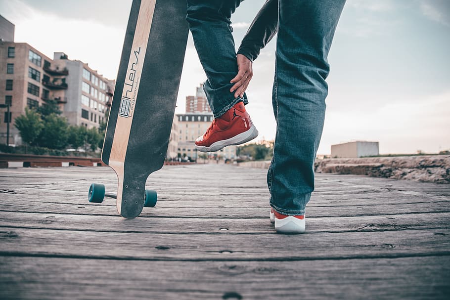 person, standing, outdoor, dock, boardwalk, skateboard, jeans, HD wallpaper