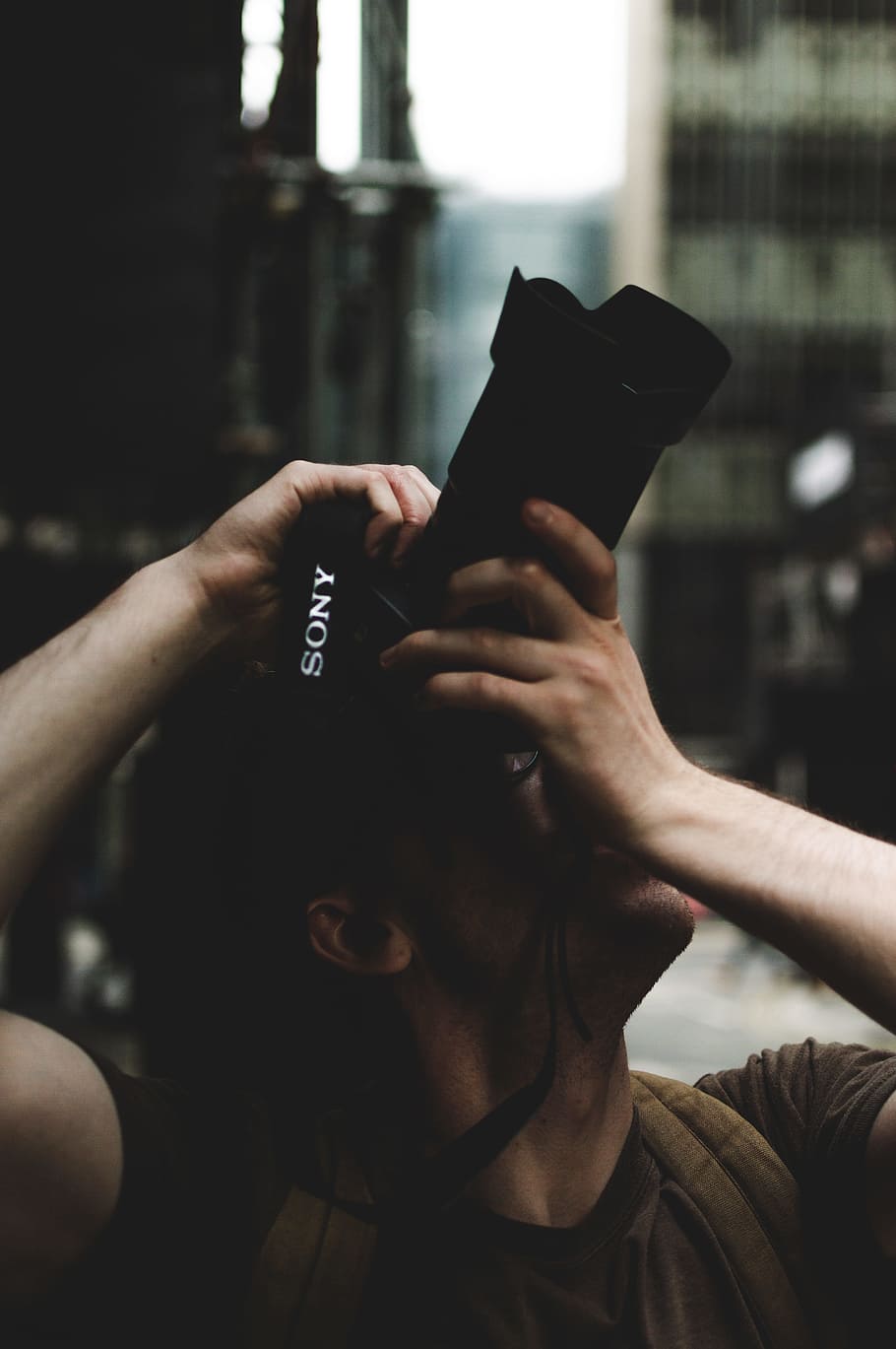 person using Sony DSLR camera, hands, lens, tech, technology HD wallpaper