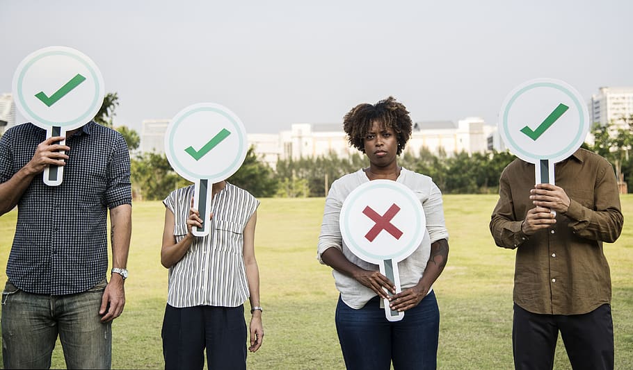 Four People Holding Signage, check, correct, daylight, friends HD wallpaper