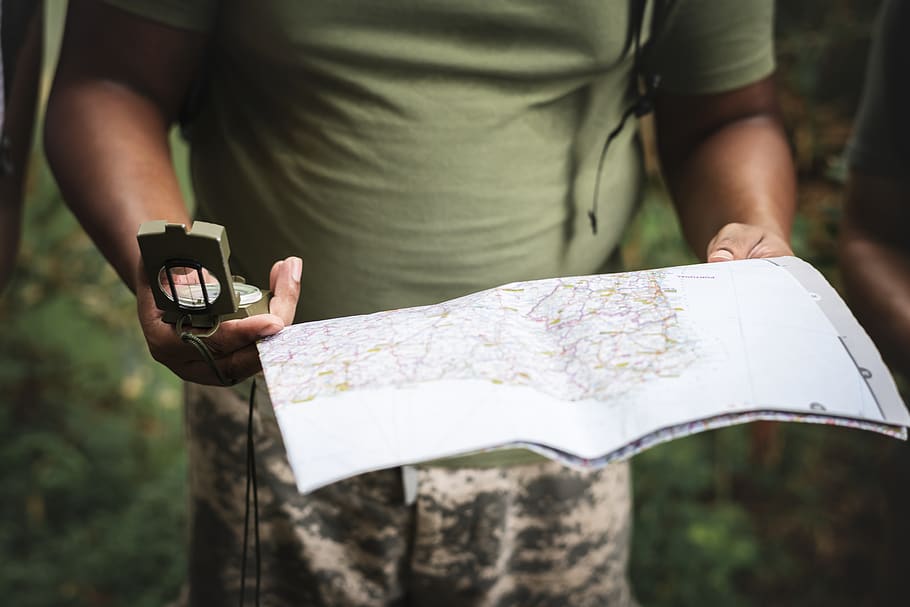 Photo of Person Holding Map and Compass, activity, adventure HD wallpaper