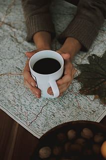 white ceramic mug filled with black liquid, map, holding, cup HD wallpaper
