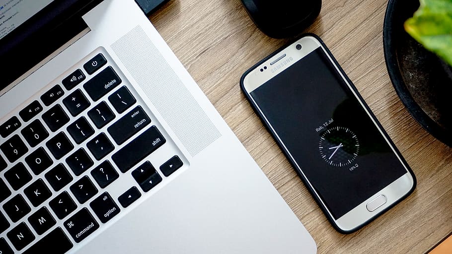 smartphone beside MacBook Pro, wireless technology, communication HD wallpaper