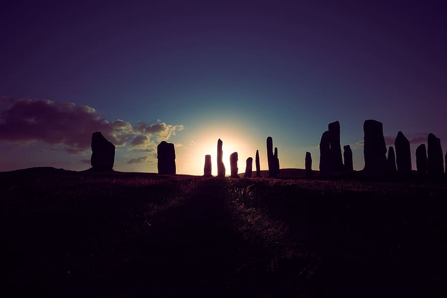 Stonehenge under blue sky, hill, sunset, sunrise, silhouette