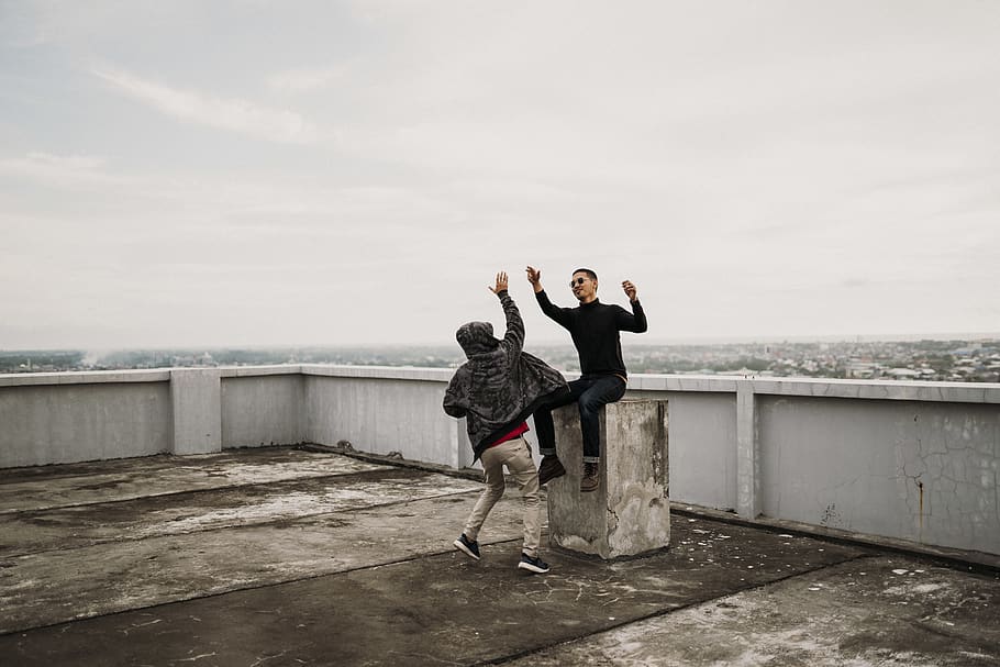 Two Men Going to High Five on Top of Building, adult, apartment building, HD wallpaper
