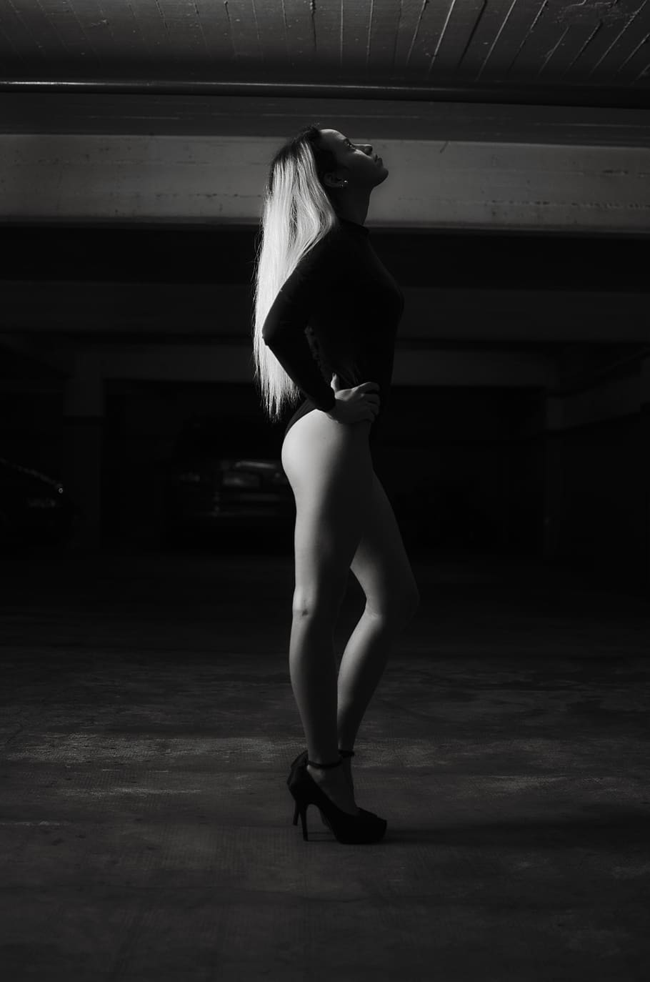 Woman Wearing Bodysuit and Pump Shoes, black and white, blonde