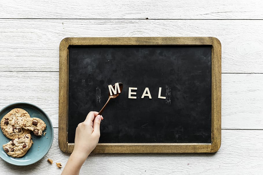 Person Holding Black and Brown Food Tray, alphabets, background HD wallpaper