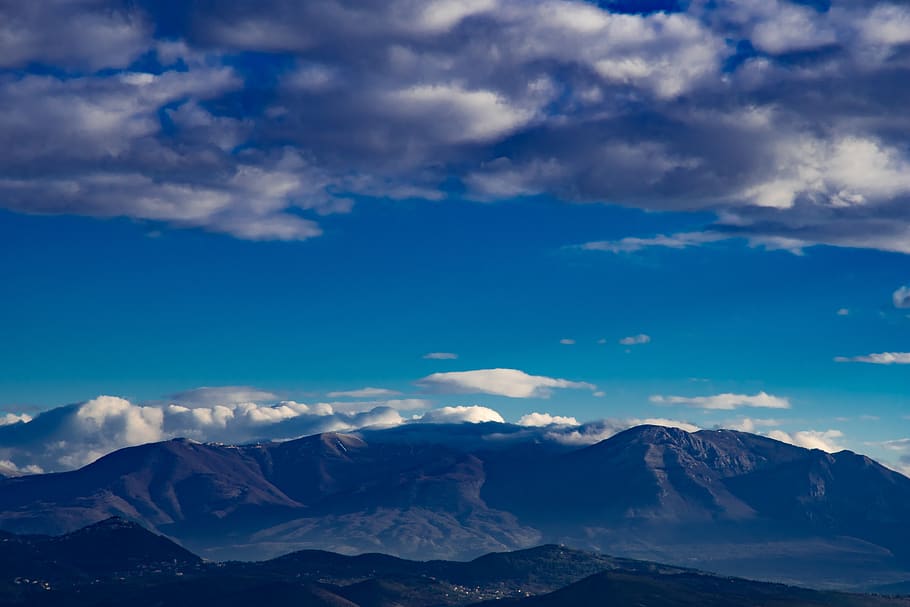mountains under skies, mountain range, nature, outdoors, sky HD wallpaper