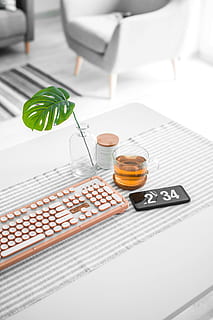 brown computer keyboard beside glass mug, minimal, flatlay, minimalism HD wallpaper