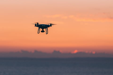 black quadcopter in sky, flying, bird, animal, aircraft, helicopter HD wallpaper