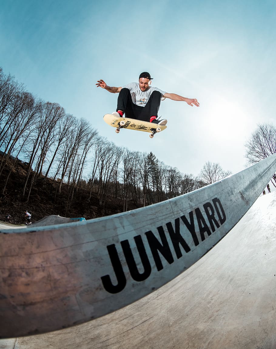 man skateboarding during daytime, full length, one person, mid-air HD wallpaper