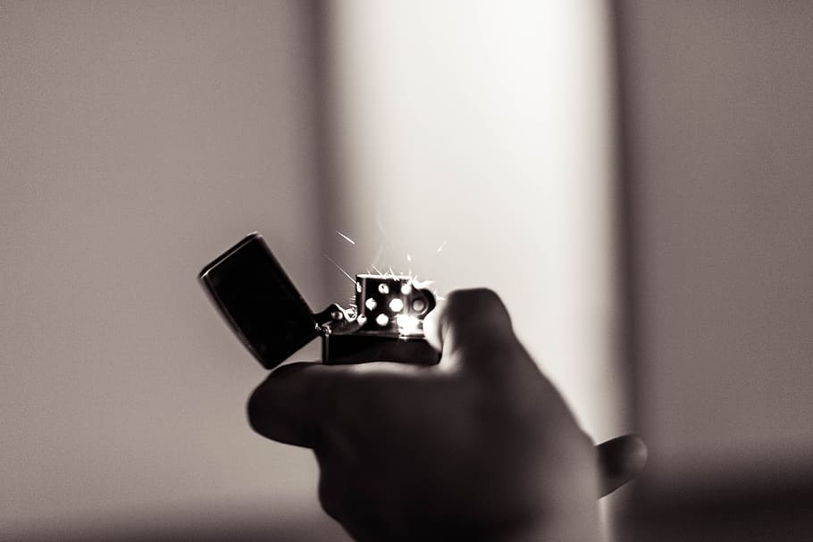 Ignited Lighter in Hand, human hand, human body part, holding HD wallpaper