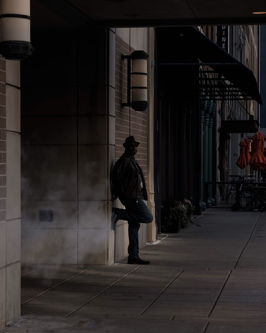 man leaning on wall silhouette, real people, one person, architecture HD wallpaper