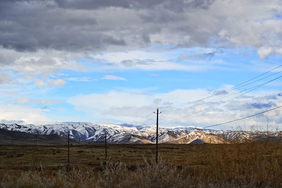 Electric Posts, field, landscape, mountain range, mountains, power lines HD wallpaper
