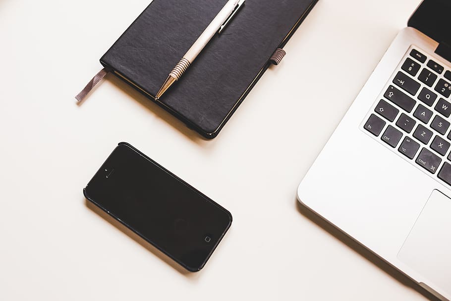Black Iphone 5, apple, desk, laptop, notebook, pen, smartphone HD wallpaper