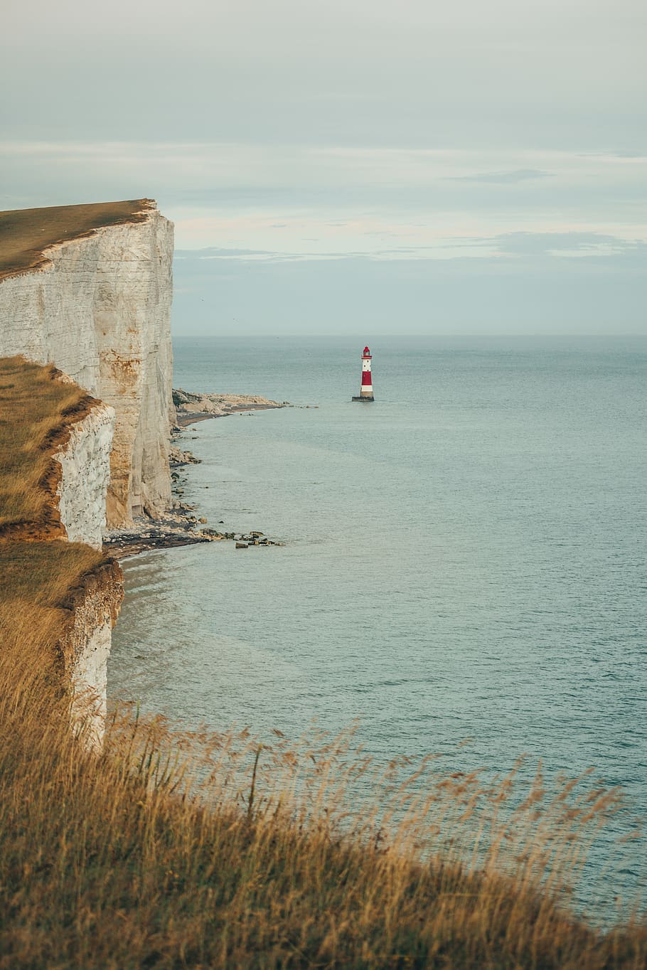 sailboat on sea, cliff, outdoors, nature, promontory, building HD wallpaper