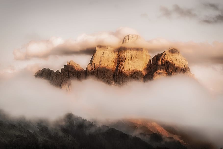clouds covering rock mountain, dreamy, landscape, sunlight, peak HD wallpaper