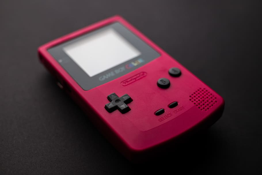 Close-up Photo of Red Game Boy Console, nintendo, portable, retro