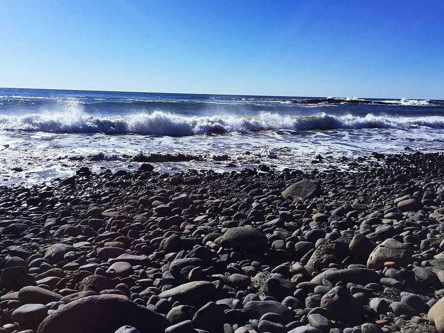 rock beach, wave, ocean, sea, shoreline, pebble, land, sky HD wallpaper