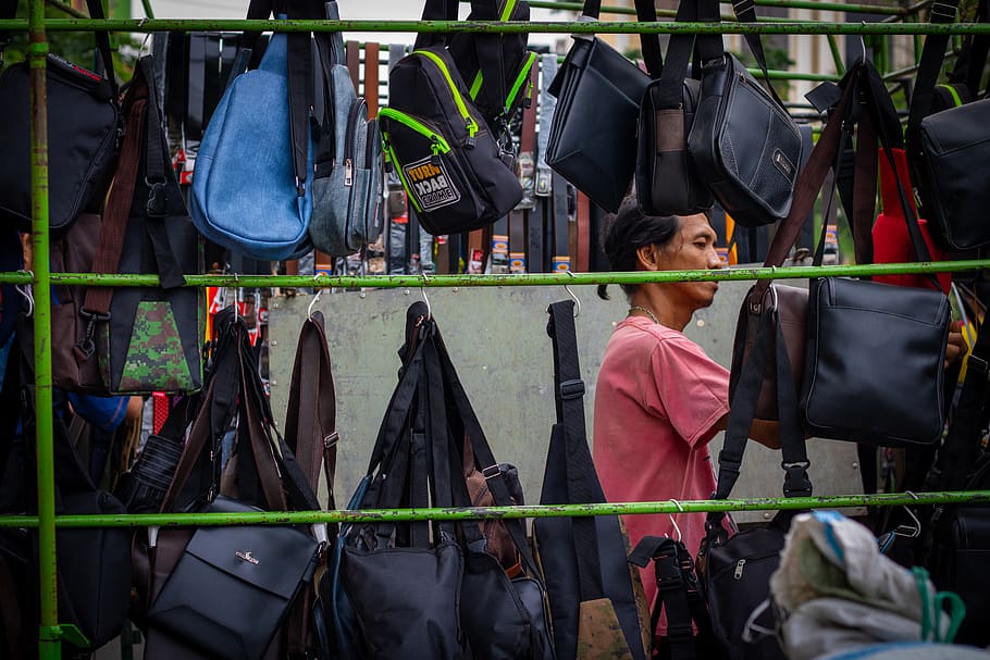 man standing behind bags, street photography, street market, merchant HD wallpaper