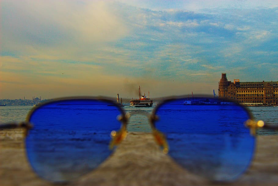 Blue Sunglasses With Black-frame on Concrete Stone, architecture HD wallpaper